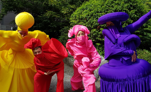 A group of performers in brightly coloured costumes - Mischief La-Bas' The Fizzicals (Credit Mark Freegard and Stanley Smith) 5
