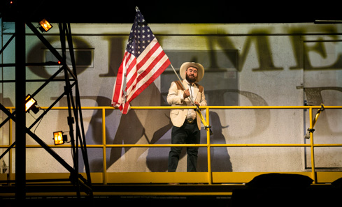 Texas oil man waving US flag