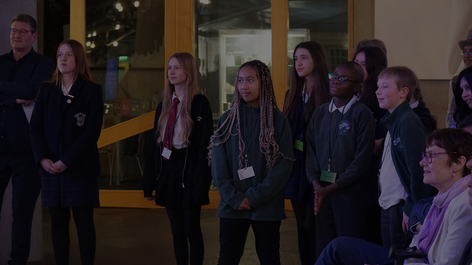 A group of children stand in the Scottish Parliament